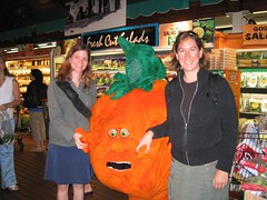 Kristy & Beth with an Orange at stew Leonard's