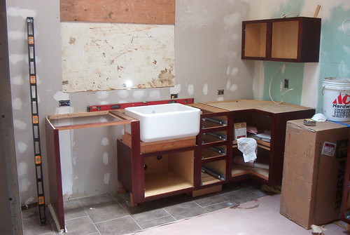 East wall cabinets and sink